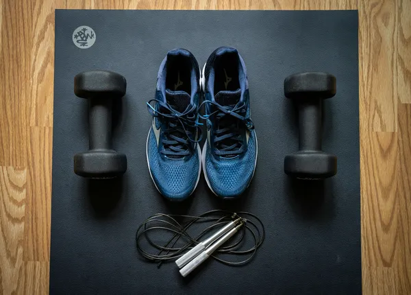 Person doing a home workout in living room